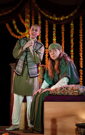 Robin McGinness as Nutrice in Poppea (In Series), scene under marigold garlands