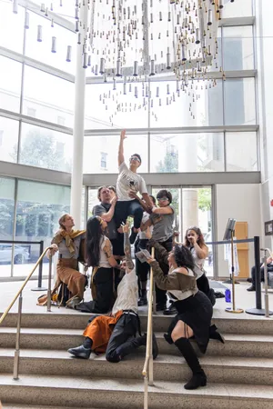 Velvet Rage, Act 2 — ensemble lift beneath the lobby chandelier